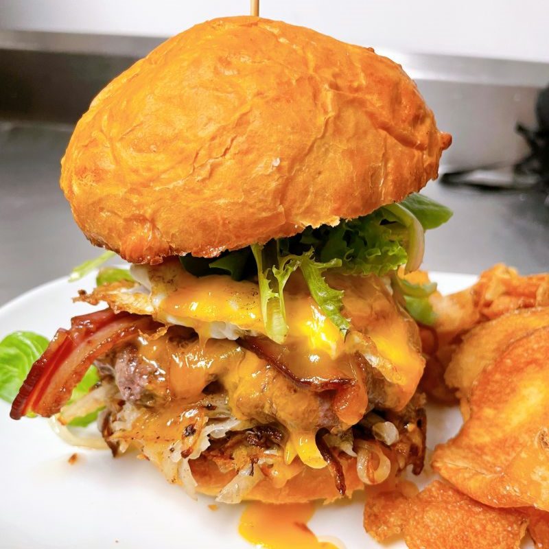 Brunch Burger Cheeseburger with bacon and a fried egg called the brunch burger